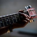 Experience the soulful melodies of an acoustic guitar. Let its emotional and inspirational sound take you to another world. Discover the beauty of music.